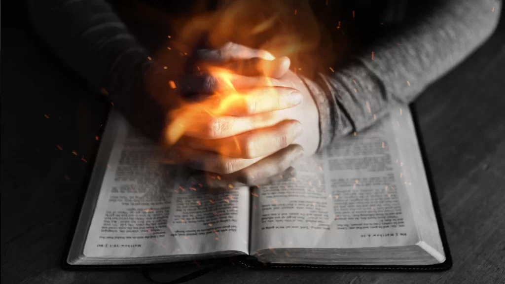 Prophet Jeremiah praying with an open Bible for people who submit a Prophetic Prayer Request through our biblical prayer ministry.
